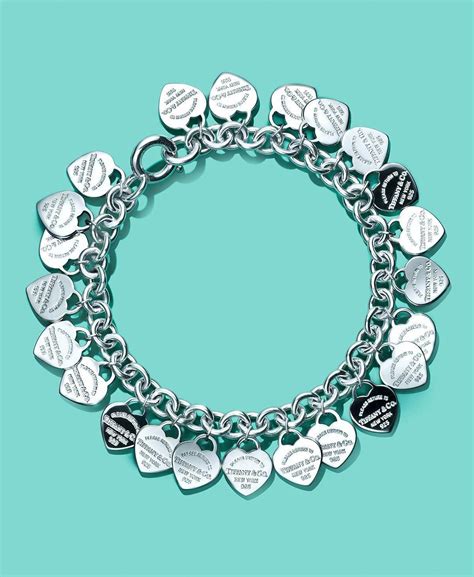 A delicate duo of engraved tags on a simple link chain exudes sophistication and elegance. . Multi heart tag bracelet tiffany